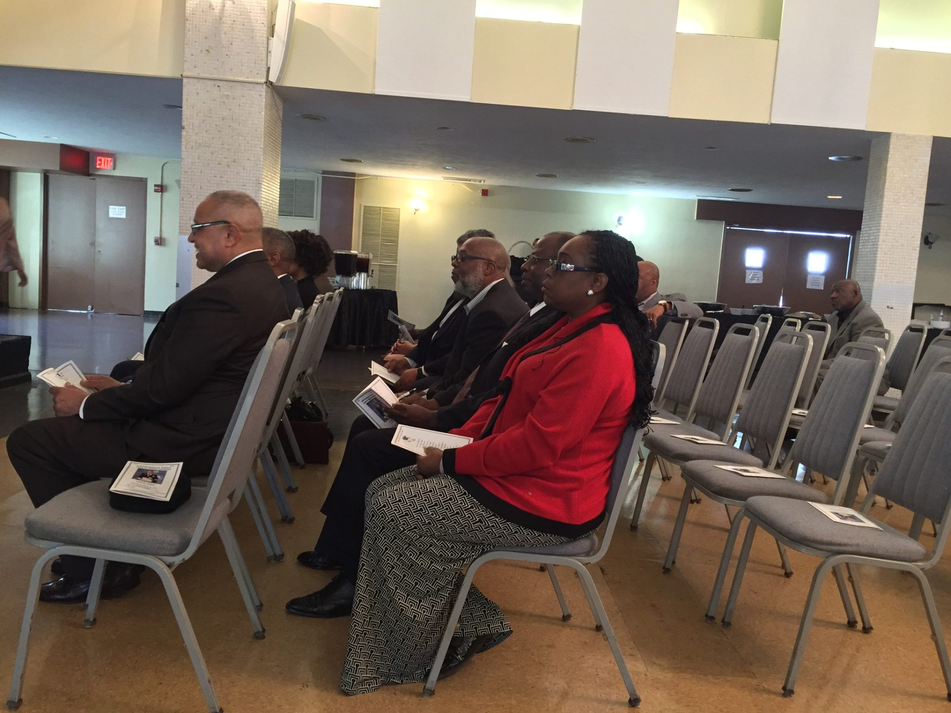 Attendees seated in auditorium